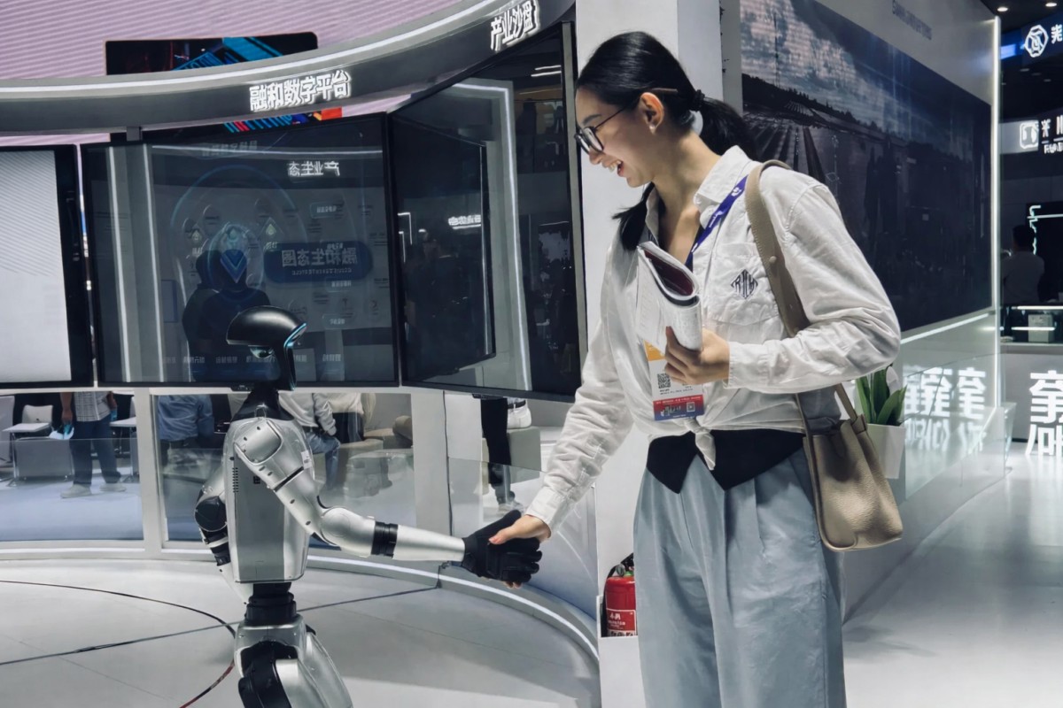 Woman shaking hands with a humanoid robot at a tech exhibition.