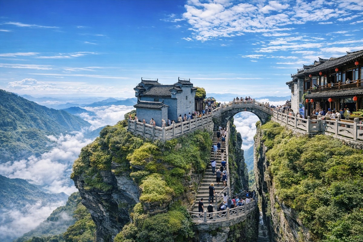 Stone bridge and temple on a mountain cliff above clouds.