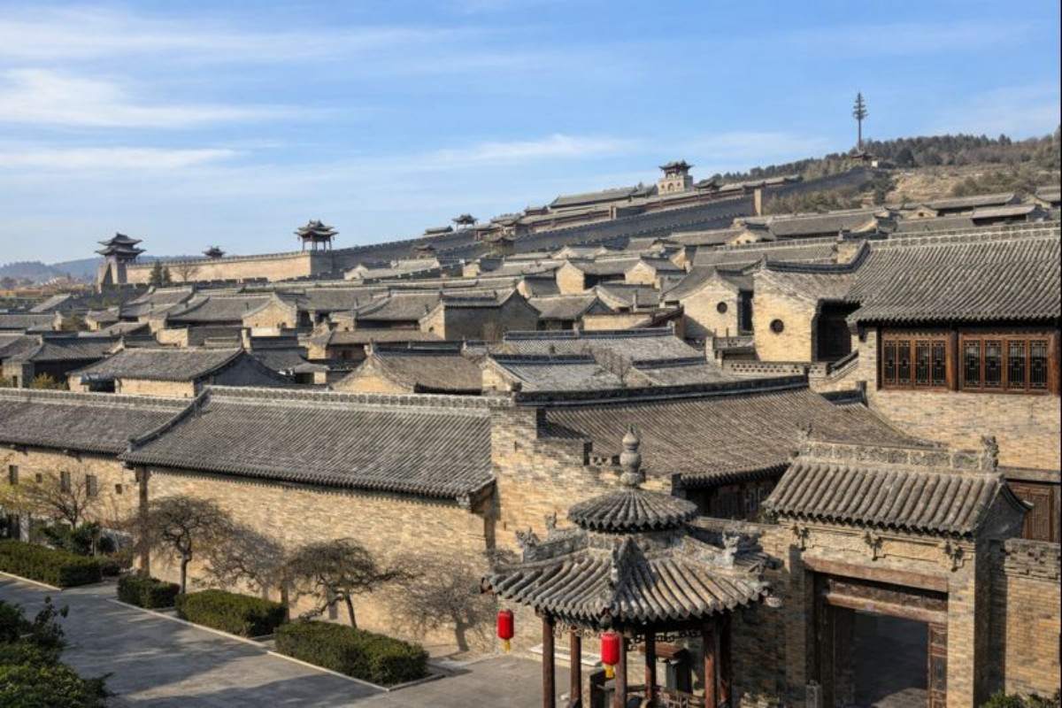 Panoramic view of ancient Chinese fortress with tiled rooftops