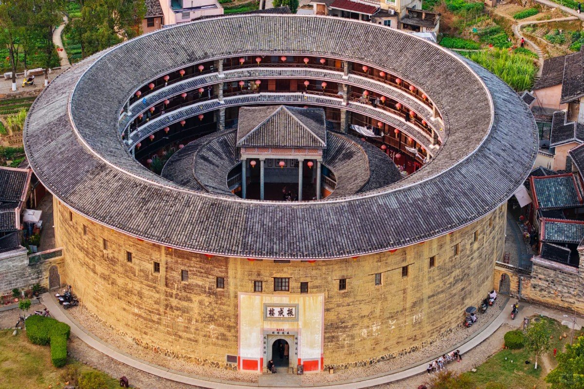 Aerial view of a traditional circular Fujian Tulou earthen building in rural China