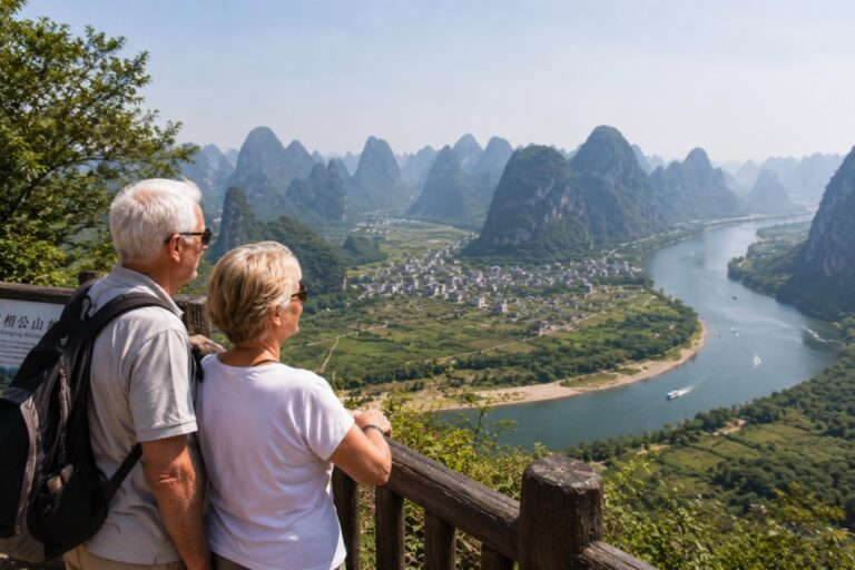 Travelers enjoying panoramic views of the Li River and Yangshuo karst mountains.