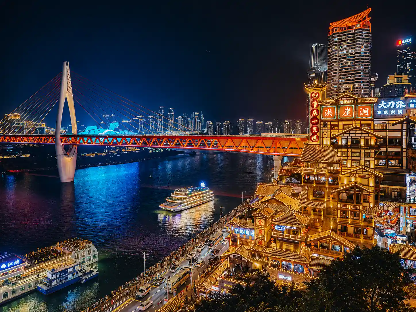 Hongya Cave illuminated at night in Chongqing