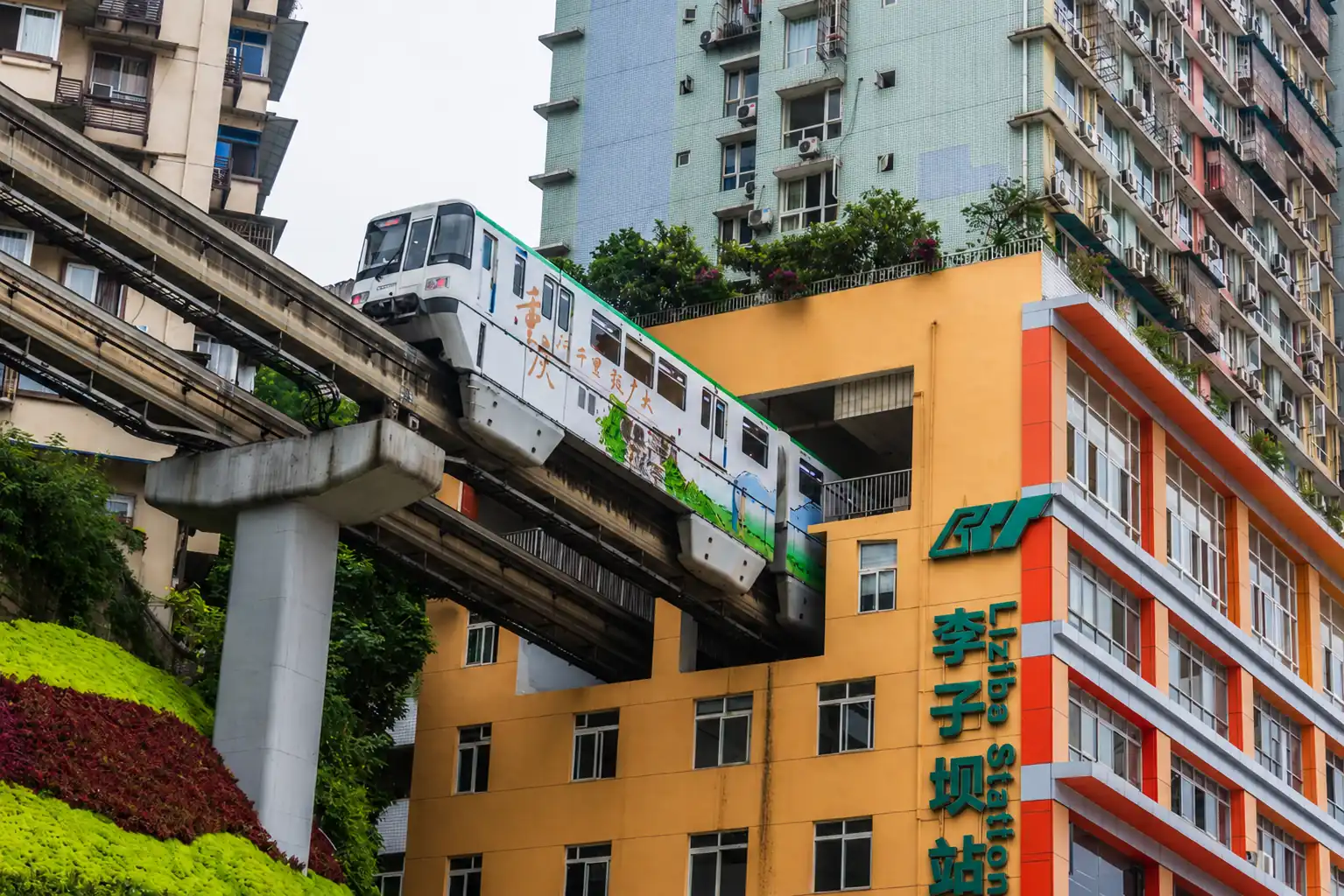 Liziba Station monorail passing through a building in Chongqing