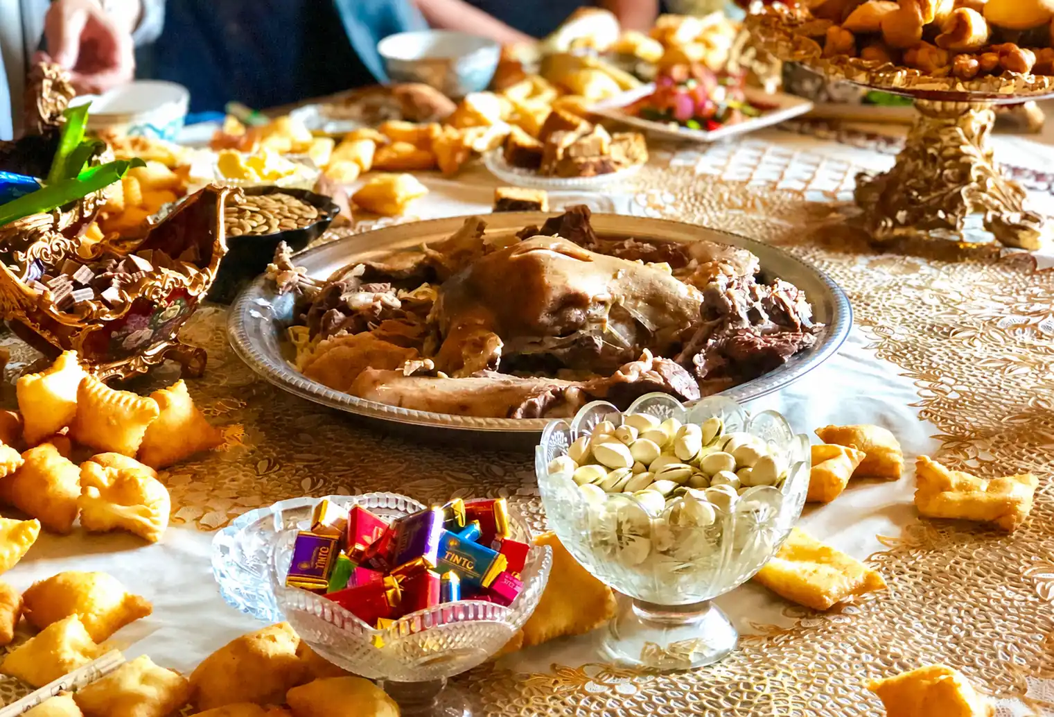 Uyghur food including lamb skewers, noodles and nang bread in Xinjiang