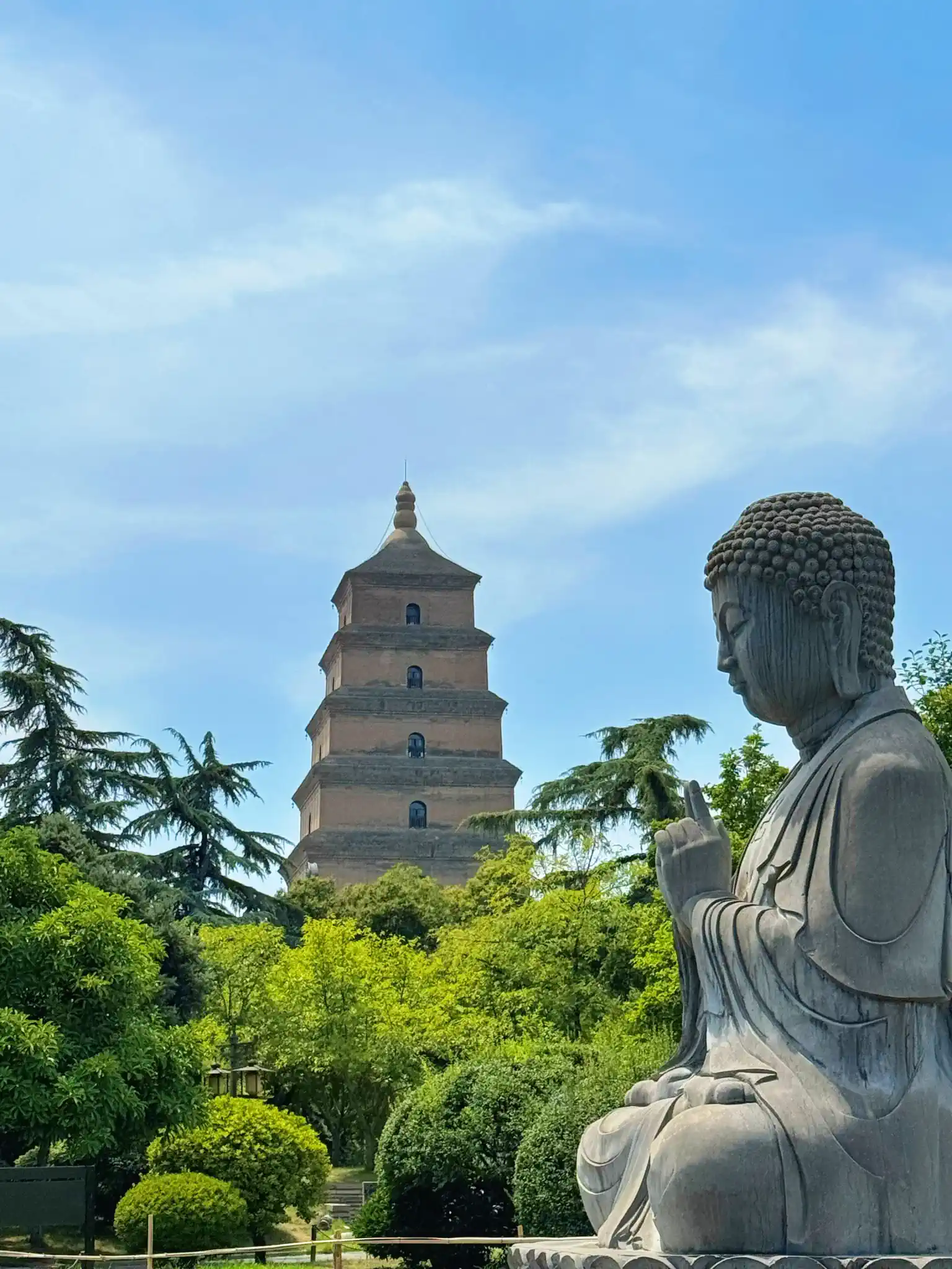 Giant Wild Goose Pagoda and Buddha statue in summer in Xi'an