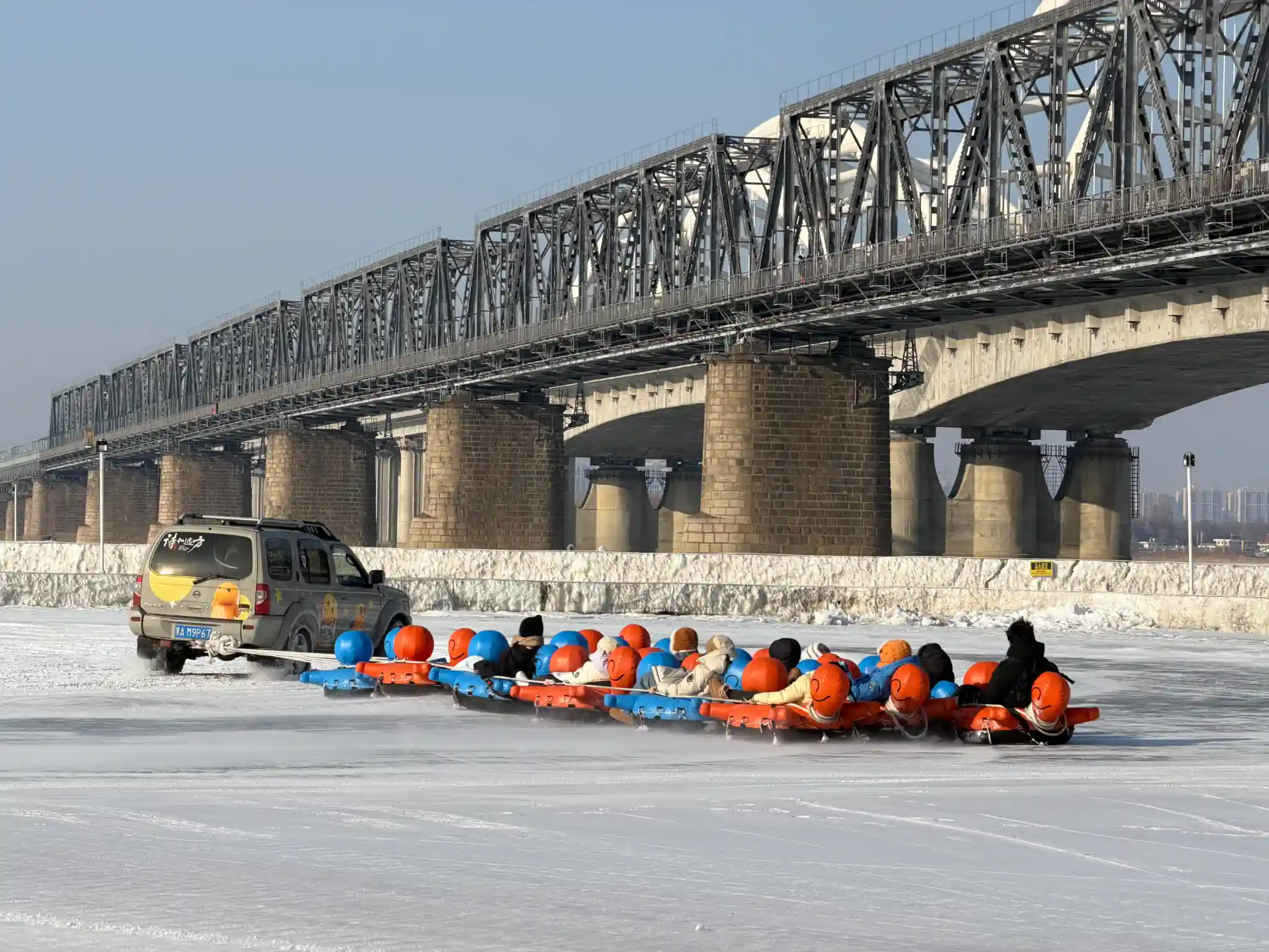 Frozen Songhua River and Stalin Park in Harbin during winter