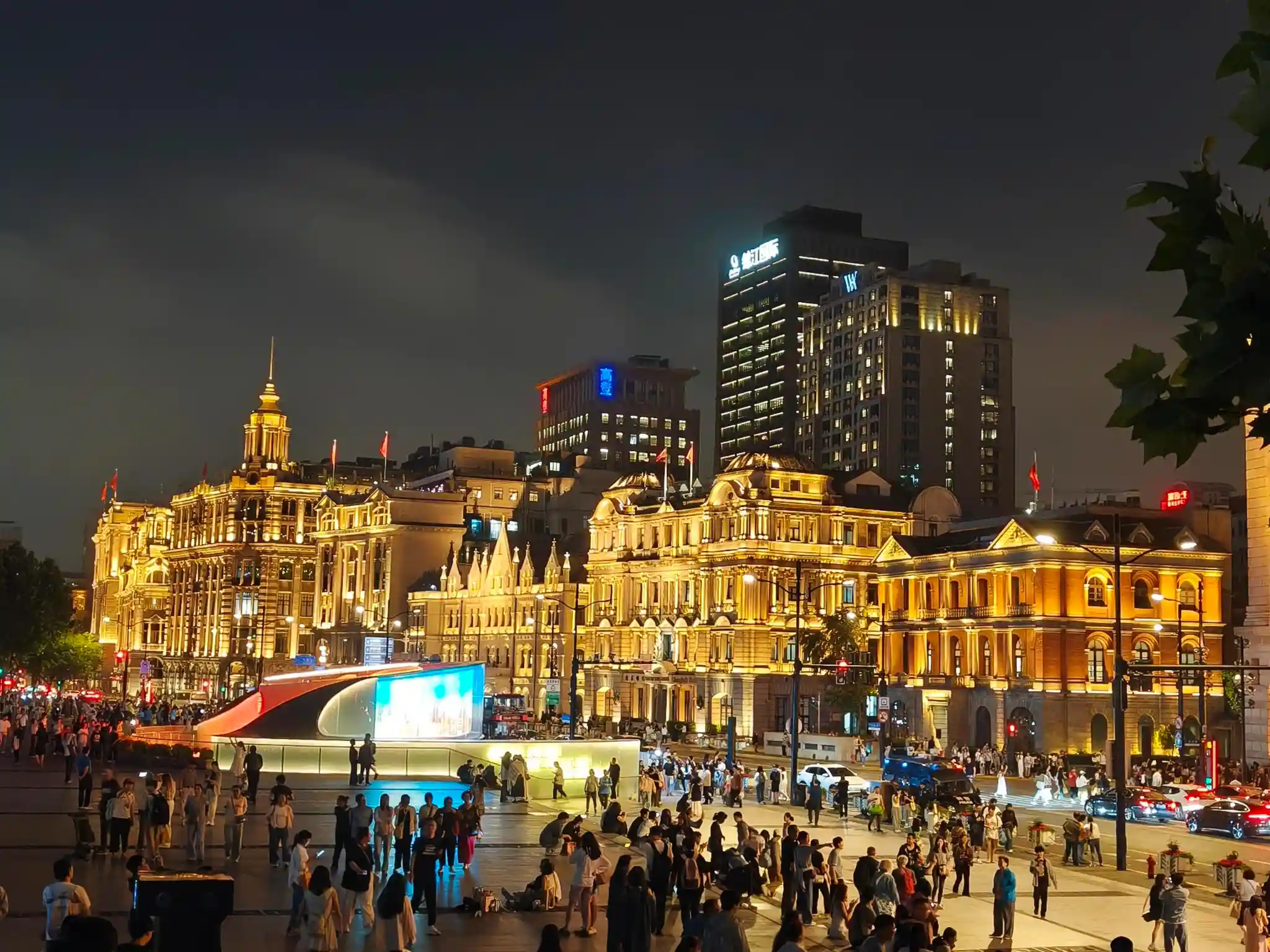 Shanghai nightlife with illuminated Bund and Pudong skyline
