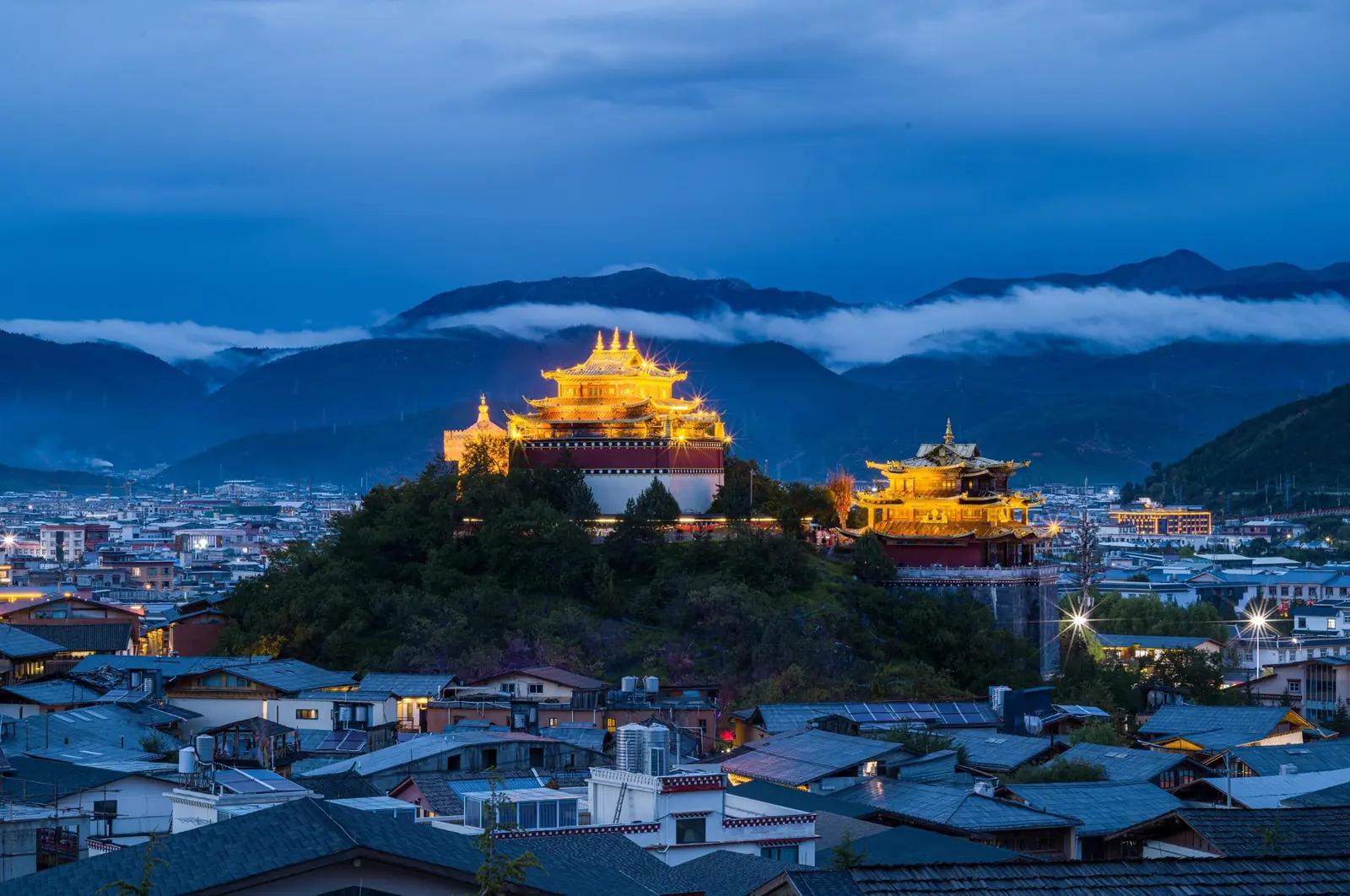 Tibetan-style architecture and rooftops in Shangri-La, Yunnan at dusk