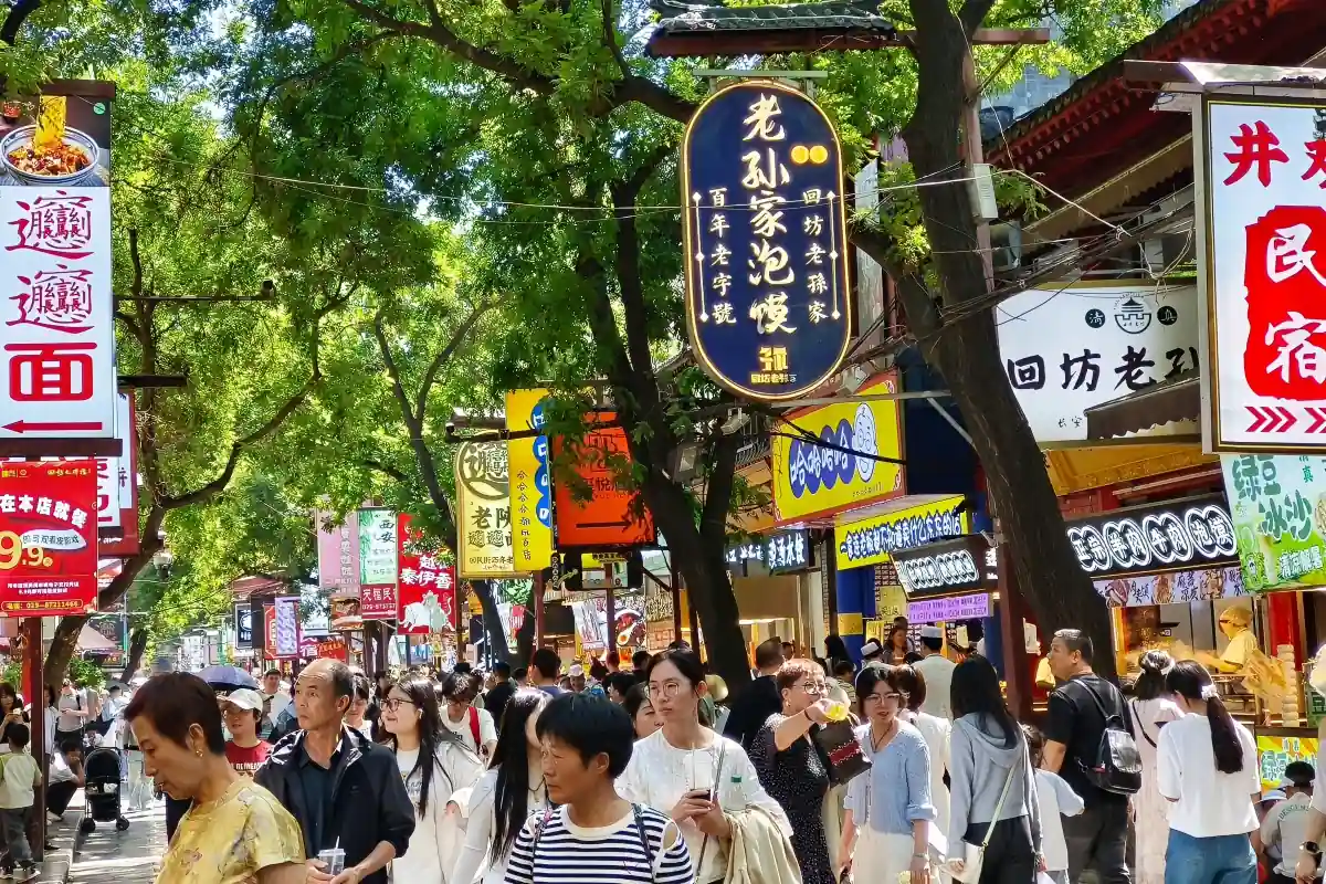 Busy food streets and local shops in Xi'an Muslim Quarter