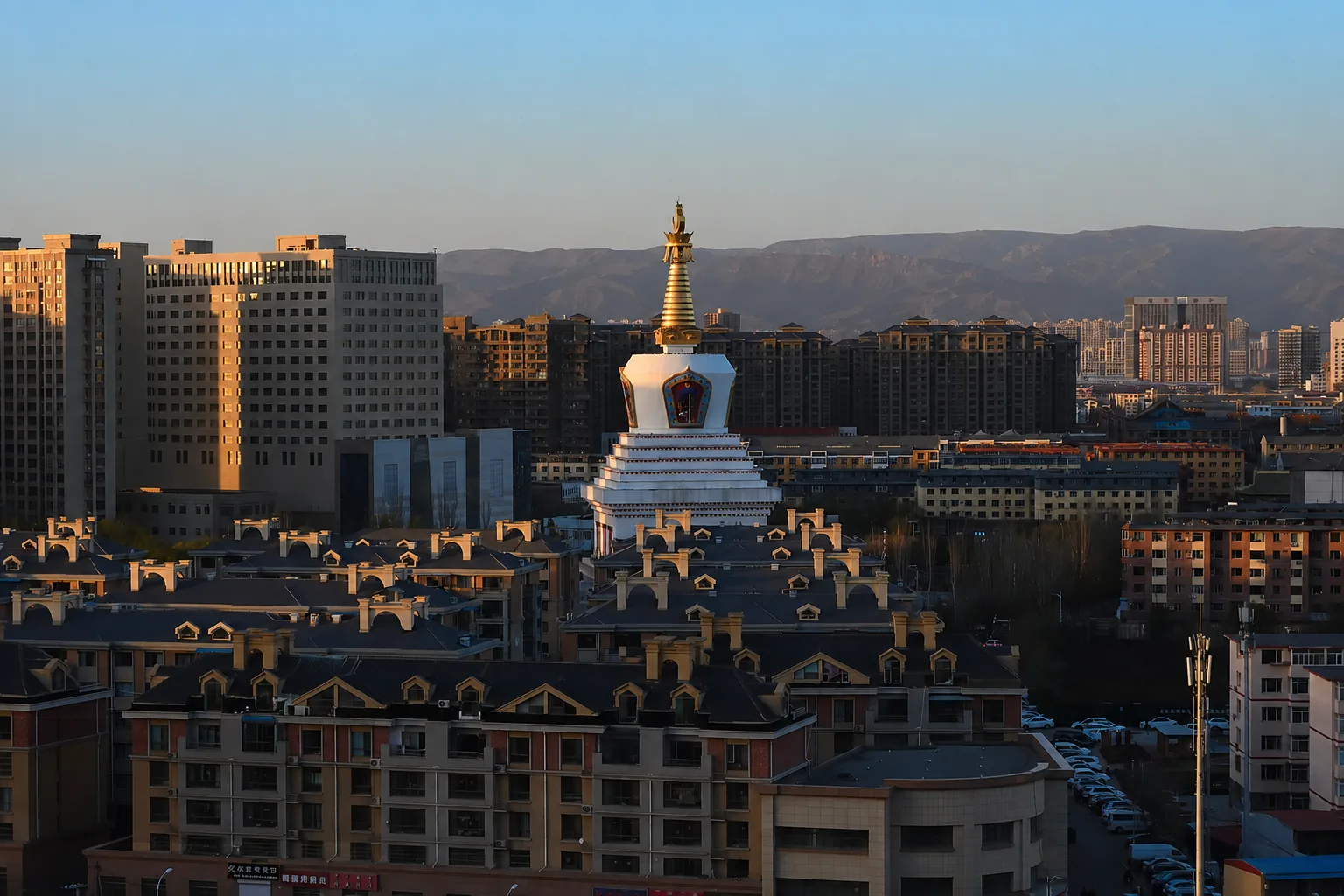 Buddhist pagoda in Hohhot with mountains in the background