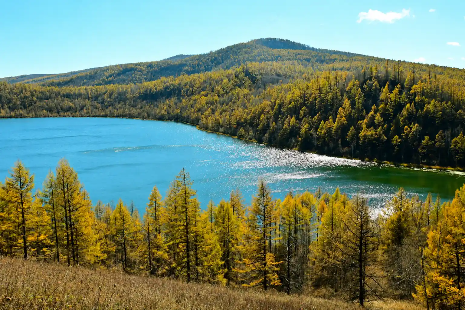 Arxan National Forest Park in Inner Mongolia with forest, volcanic landscape and lake scenery