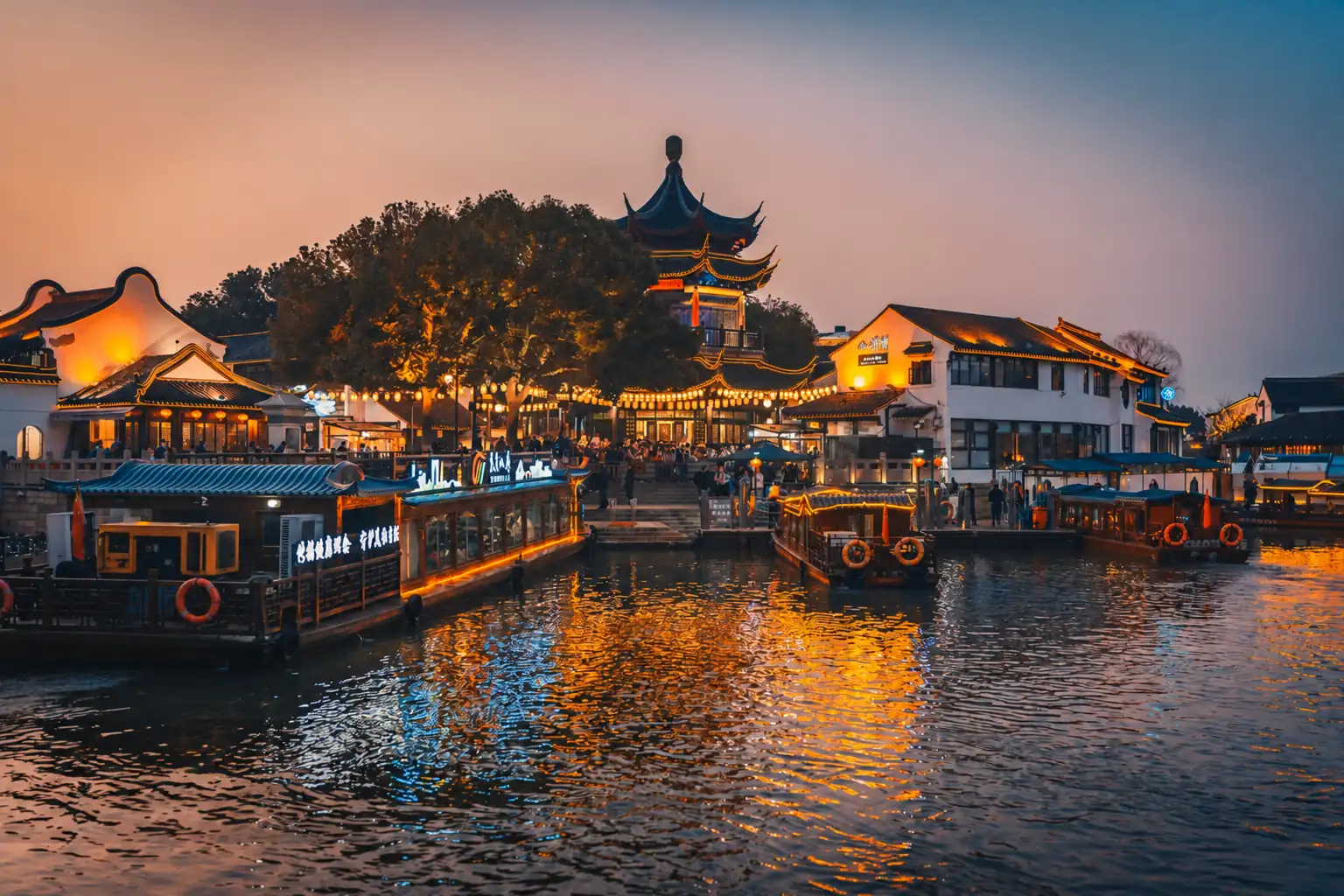 Boats on the Shantang Street in Suzhou at dusk