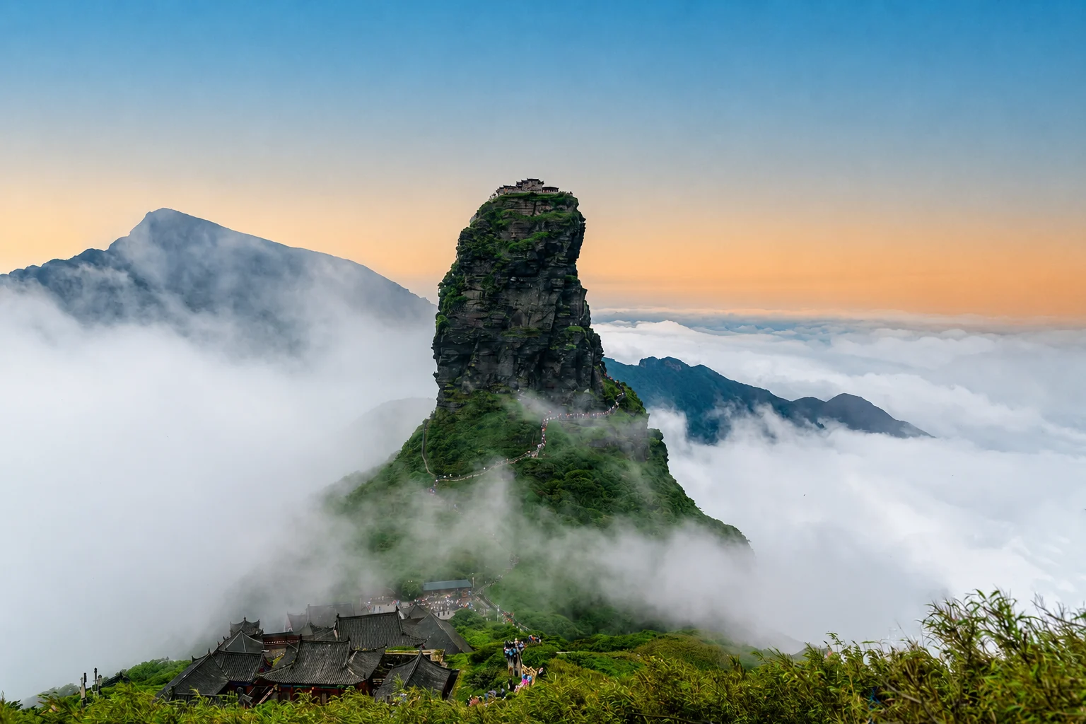 Fanjingshan peak rising above a sea of clouds in Guizhou