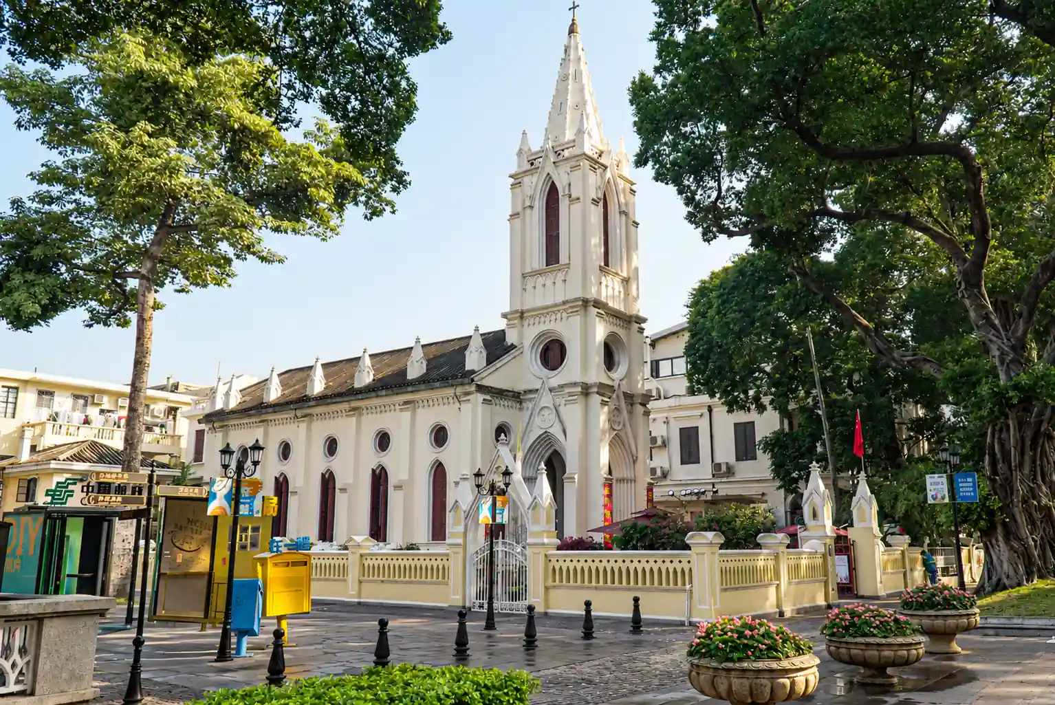 Tree-lined street and historic European-style buildings on Shamian Island in Guangzhou