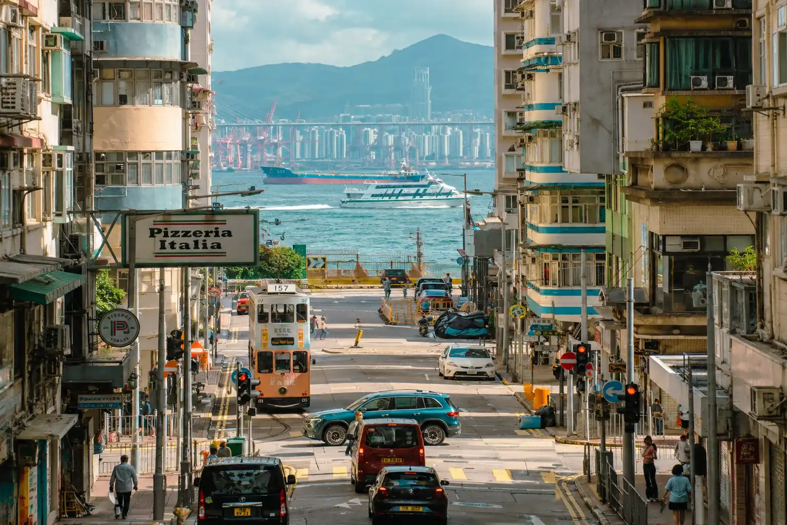 Hong Kong Island tram street with Victoria Harbour view