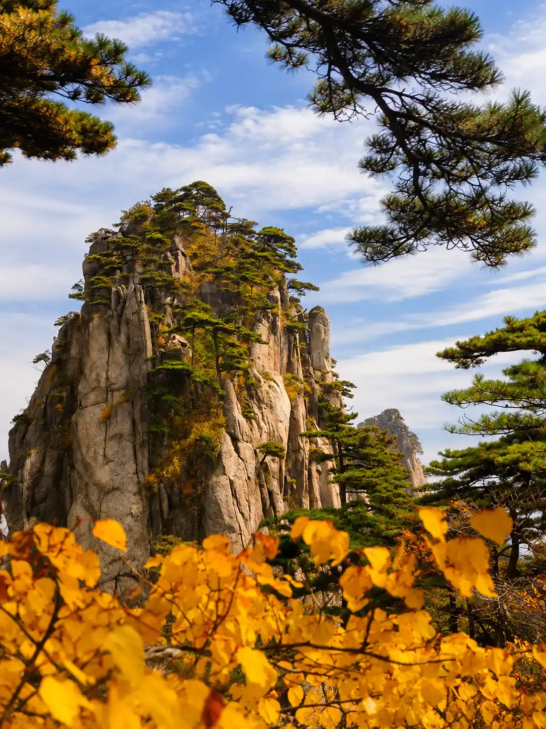 Autumn foliage and granite peaks on Mount Huangshan