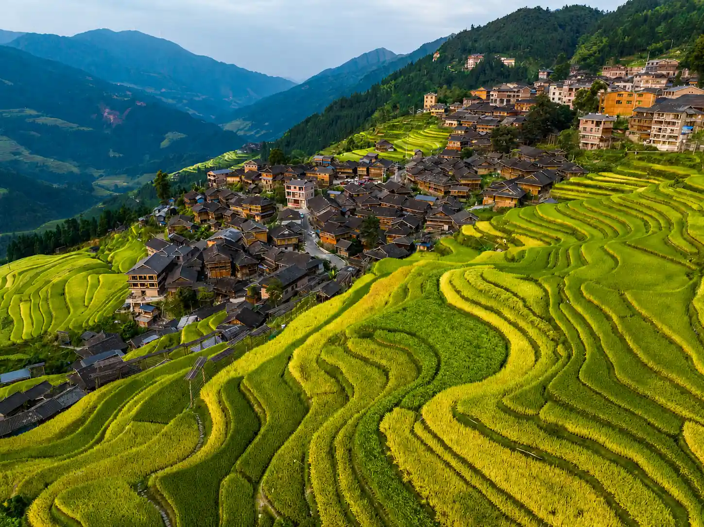 Mountain village surrounded by Jiabang Rice Terraces in Guizhou