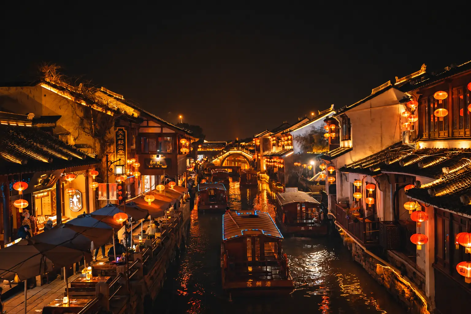 Shantang Street in Suzhou with canals, stone bridges and traditional waterside buildings