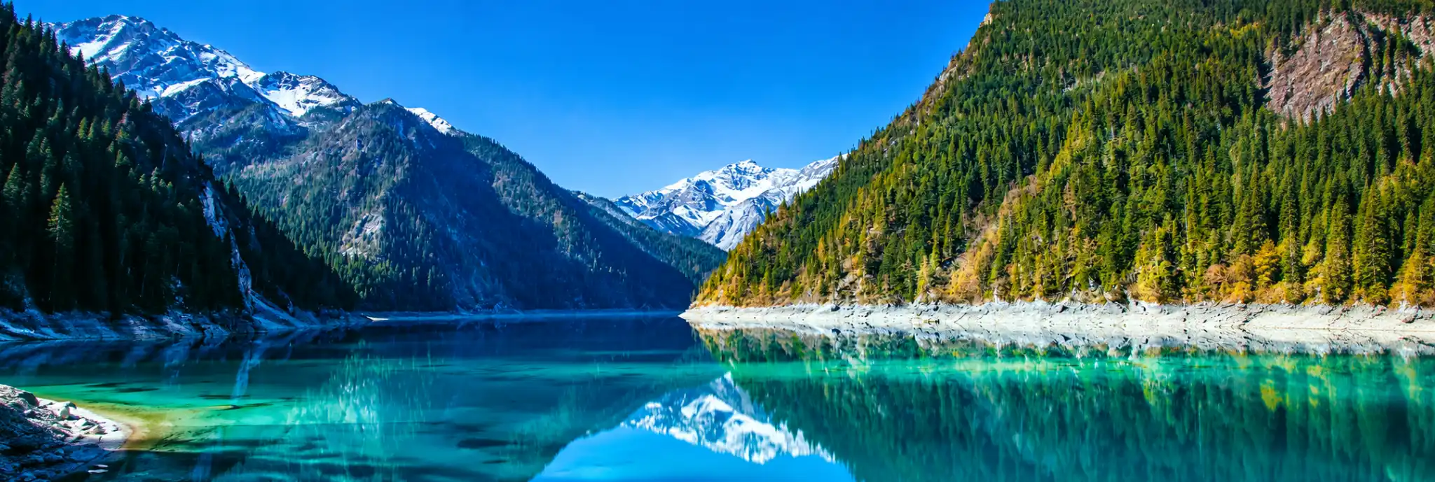 Jiuzhaigou National Park with turquoise lakes, colorful forests and mountain scenery