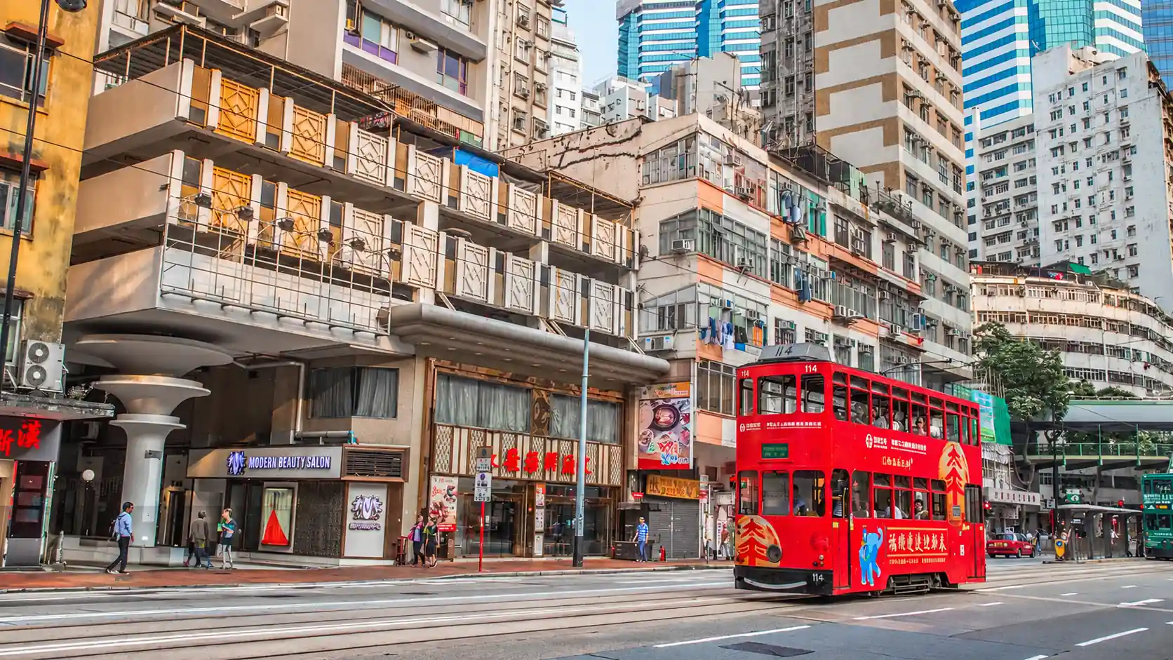 Red Double-Decker Tram on a Hong Kong Street