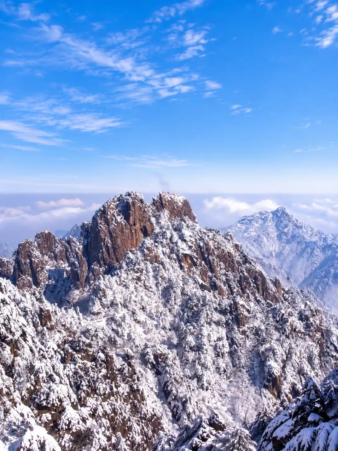 Snow-covered granite peaks on Mount Huangshan in winter