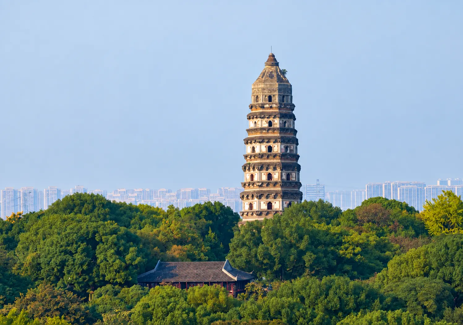 Tiger Hill Pagoda towering over the green city park