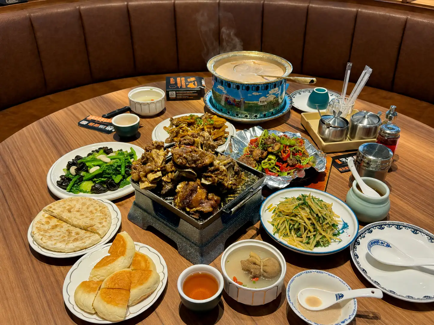 Traditional Inner Mongolian dishes served together on a dining table
